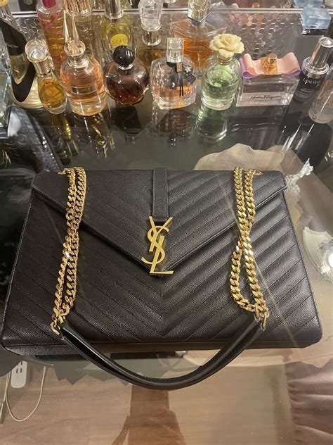 ysl shoe repair|YSL envelope bag.